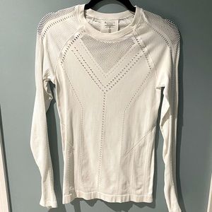Woman’s long sleeve Athleta top in white